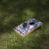 950909-000_Cornhole-Spill_Closeup4